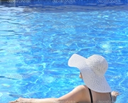 Woman sitting in a swimming pool