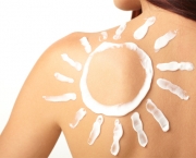 woman with sun-shaped sun cream